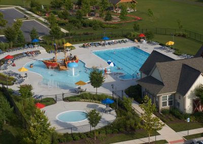 6,314 square foot swimming pool with splash park, water features, and a 200 square foot wading pool.